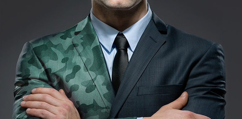 Man in suit showing military to business